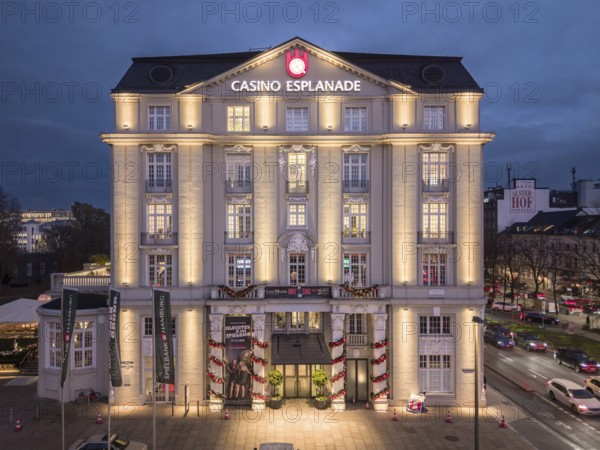 Aerial view of the illuminated Casino Esplanade (Spielbank Hamburg) at Blue Hour on Stephansplatz, Hamburg, Germany