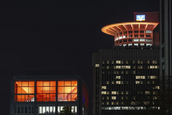 On the occasion of Orange Day, the international day against violence against woman on 25.11.2025, numerous buildings on the banking skyline in Frankfurt am Main were illuminated in orange, including the DZ Bank Tower, Frankfurt am Main, Hesse, Germany Germany