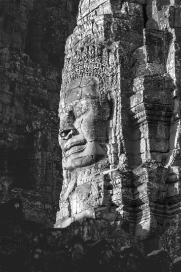 Huge stone-carved face of Bodhisattva Lokeshvara, also Avalokiteshvara, Bayon Temple, Angkor Thom, UNESCO World Heritage Site, Angkor Wat, Siem Reap, Cambodia