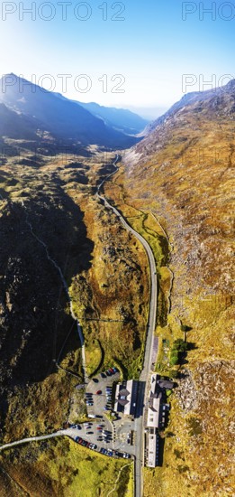 Autumn colours of Pen-y-Pass over Miner's Track, Start Point and road A4086 from a drone, Snowdonia, Wales, UK