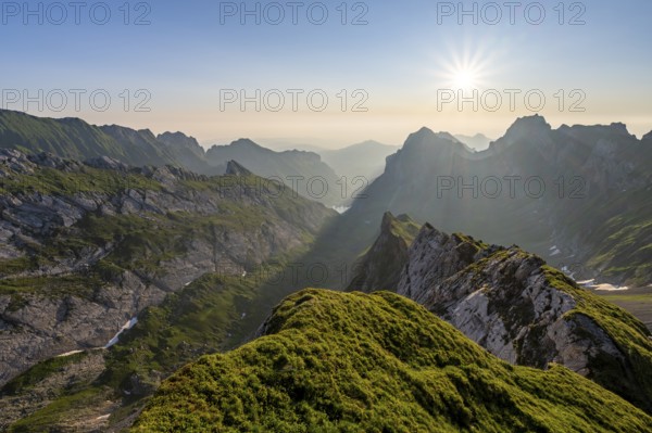 View over Alpstein Mountains into the Meglisalp Valley at sunrise, Rotstein Pass, SÃ¤ntis, Appenzell, Switzerland
