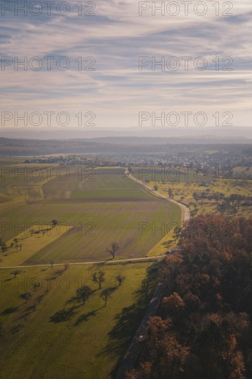 Wide fields stretch under a large sky, captured in peace and serenity