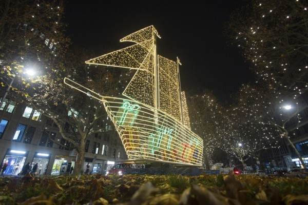 The KurfÃ¼rstendamm in western Berlin with Christmas lights and several light installations, such as this ship, on 25.11.2025. The magnificent boulevard is illuminated with 150, 000 lights between Breitscheidplatz and Halensee