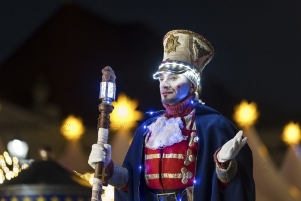 A Black-winged Stilt walker at the Christmas market WeihnachtsZauber Gendarmenmarkt on the Gendarmenmarkt, Berlin, 24.11.2025