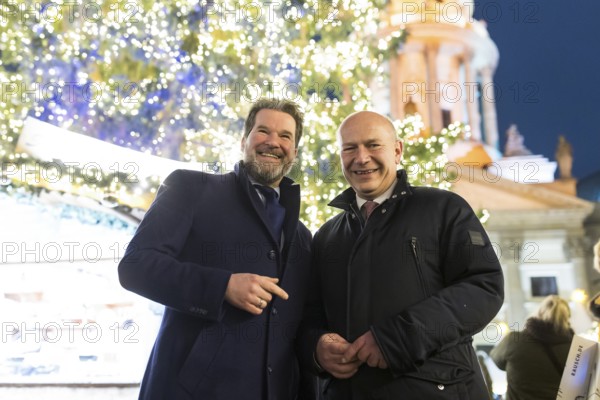 Kai Wegner, Governing Mayor of Berlin, in front of the Christmas tree and the German Cathedral at the Christmas market WeihnachtsZauber Gendarmenmarkt on the Gendarmenmarkt, Berlin, 24.11.2025