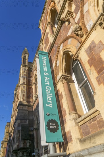 Sign outside Museum and Art gallery, Royal Albert Memorial Museum building RAAM, Exeter city centre, Devon, England, UK built 1868