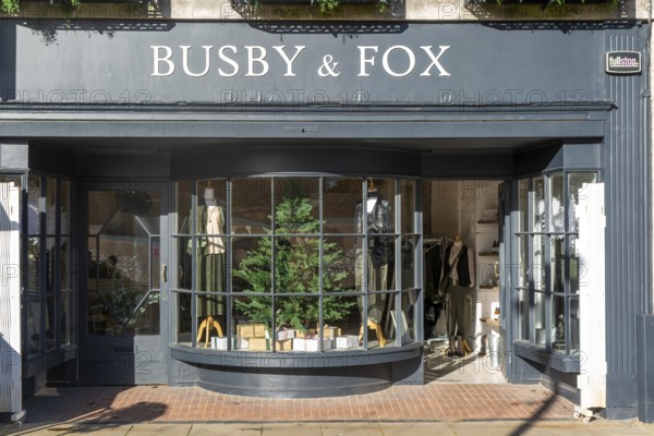 Shopfront window display Busby & Fox shop store, Cathedral Yard, Exeter city centre, Devon, England, UK