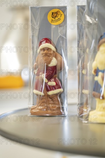 Chocolate Santa figure in red coat wrapped in transparent packaging, Christmas baking, Haselstaller Hof, Wildberg, Calw district, Germany