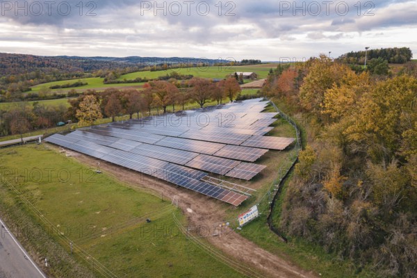 Solar system in autumn landscape with a view of the horizon, PV Freifaechenanlage construction, Weil der Stadt, Germany