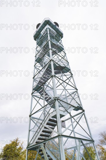 Tall metal tower with stairs framed by cloudy sky, DÃ¼rrenmettstetten observation tower, Sulz am Neckar, Germany