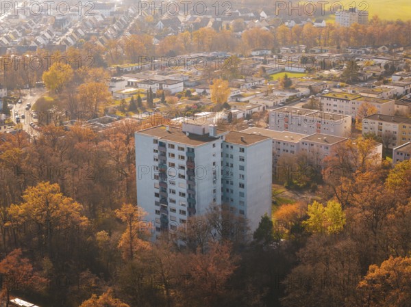 Multi-family house in autumn surroundings, surrounded by an urban silhouette, MÃ¼hlacker, Enzkreis, Germany