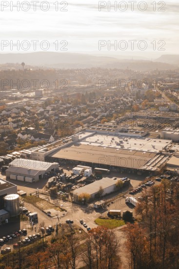 Industrial landscape in autumn mood with urban development in the background, MÃ¼hlacker, Enzkreis, Germany