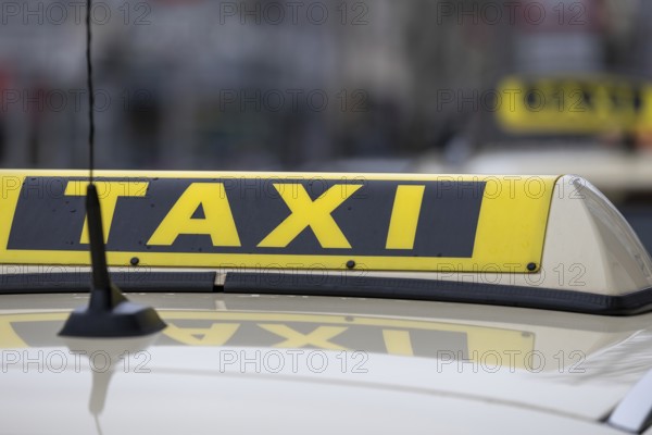 Close-up of a taxi sign in Germany