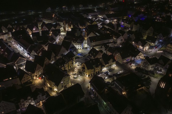 Extensive city view at night with illuminated houses, Nagold, Calw district, Germany