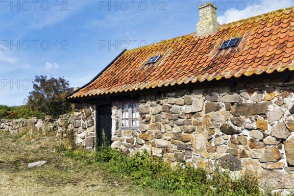 Traditional stone house, red tile roof, FrederiksÃ¸, Frederiksö, Ertholmene, Pea Islands, Bornholm, Denmark