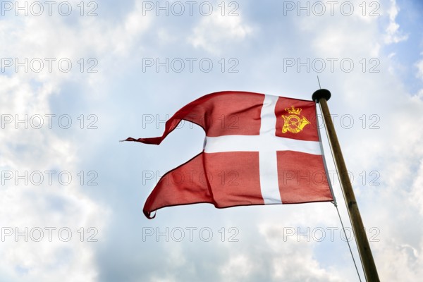 Danish postal flag, national flag with crown and post horn on a mail ship, ChristiansÃ¸ and FrederiksÃ¸, Frederiksö, Christiansö, Ertholmene, Pea Islands, Bornholm, Denmark
