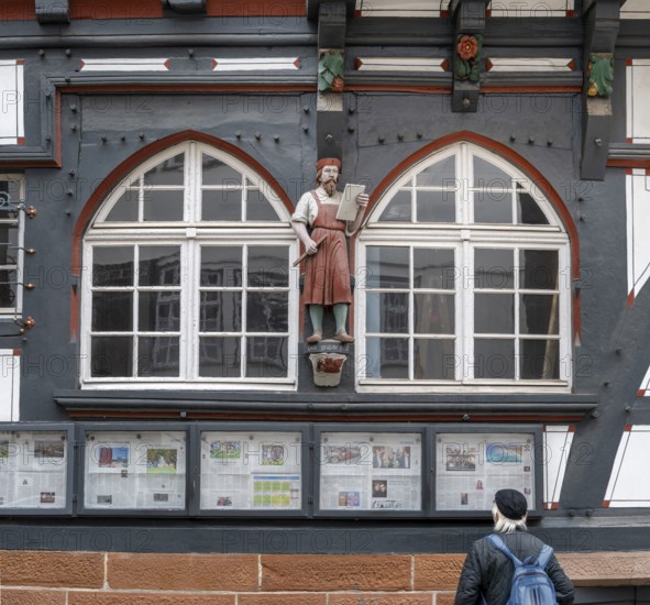 Decoration on half-timbered house, former press house, market, Oberstadt, Marburg, Hesse, Germany