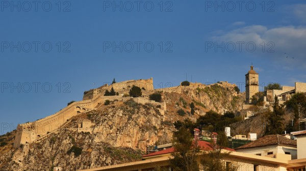 Palamidi Fortress, mighty castle spread over a hill with ruins under blue sky, Nauplion, Nafplion, Peloponnese, Greece