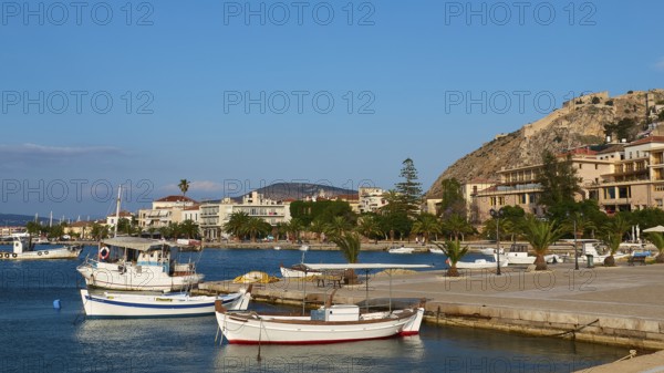 Nauplion Harbour, Palamidi Fortress, Two boats in the calm water of a picturesque coastal port, Nauplion, Nafplio, Peloponnese, Greece