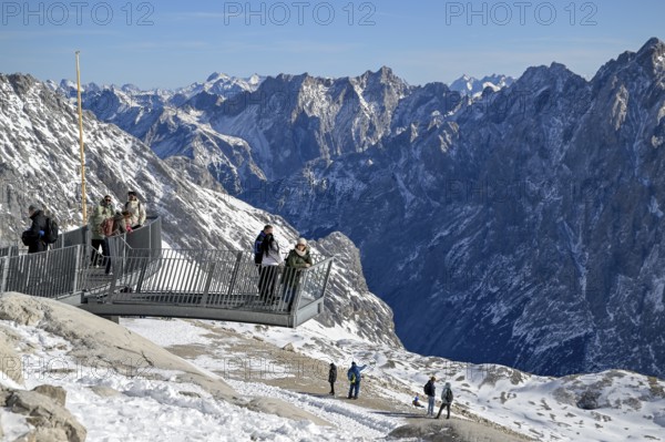 Tourists on a viewing platform on Zugspitzplatt, Grainau municipality, Garmisch-Partenkirchen district, Bavaria, Germany