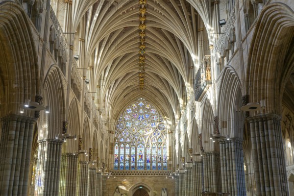 View to west window, vaulted ribbed ceiling inside Exeter cathedral church, Exeter, Devon, England, UK