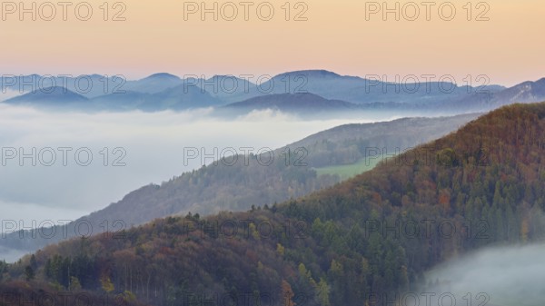 View from the Gisliflue of the Jura foothills covered in fog, in the light of dawn, Talheim, Canton, Aargau, Switzerland