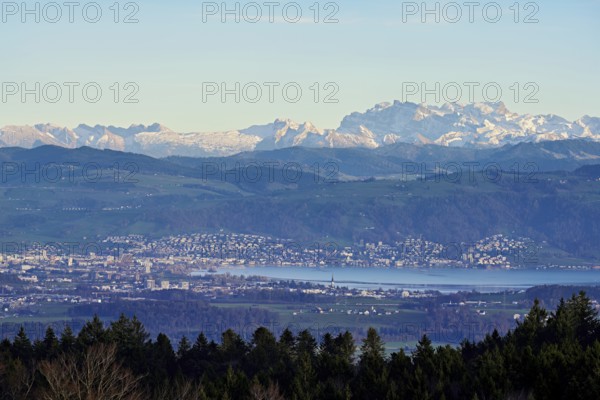 View from Horben of the city of Zug with Lake Zug, with the snow-covered Glarner Alps in the background, Beinwil Freiamt, Canton, Aargau, Switzerland