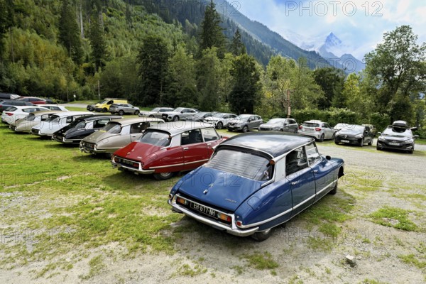 A group of parked vintage CitroÃ«n DS cars, classics with aerodynamic design, Chamonix-Mont-Blanc, Haute-Savoie, France