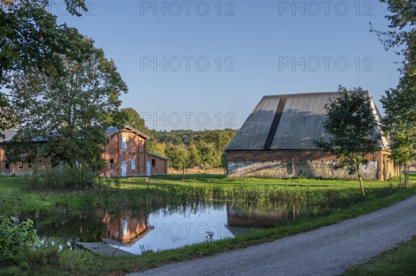 Historic buildings, pig and poultry house and pond of a manor from 1923, Othesdorf, Mecklenburg-Western Pomerania, Germany