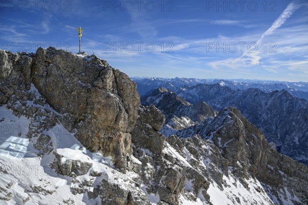 Zugspitze summit cross (2962 m), in the background the Wetterstein Mountains, Grainau municipality, Garmisch-Partenkirchen district, Bavaria, Germany