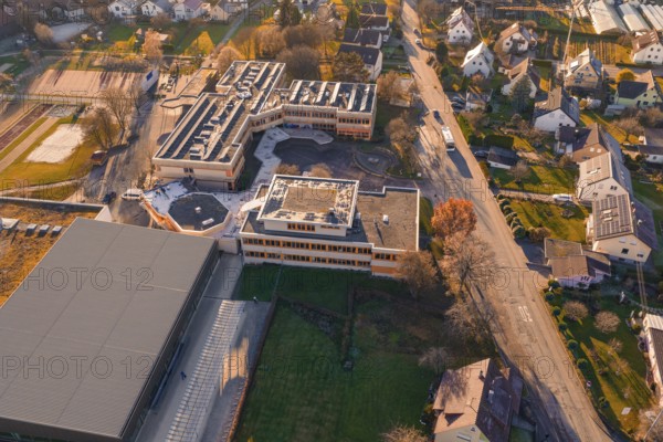 Aerial view of a building complex with a view of surrounding roads and countryside, Althengstett, Calw district, Germany