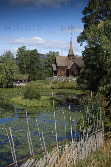 Artificial lake, Garmo Stave Church, Maihaugen open-air museum with houses and objects from farms in Gudbrandsdal, Lillehammer on Lake MjÃ¸sa, Innlandet Municipality, Norway