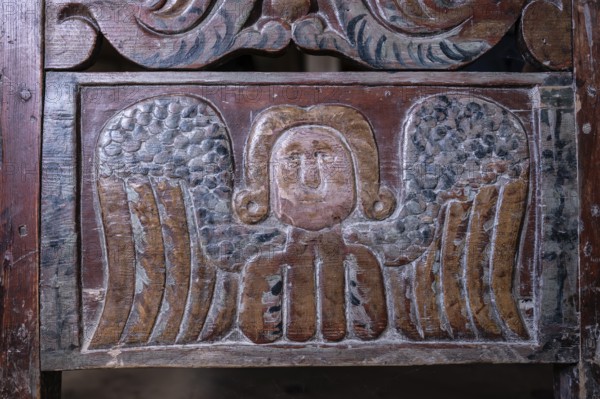 Angel, wooden relief, cradle, BjÃ¸rnstad, farm from VÃ¥gÃ¥, Maihaugen open-air museum with houses and objects from farms in Gudbrandsdal, Lillehammer on Lake MjÃ¸sa, Innlandet Municipality, Norway