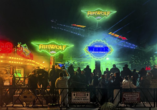 Many people at the All Saints Fair at night, the biggest old town fair in Europe, Soest, North Rhine-Westphalia, Germany