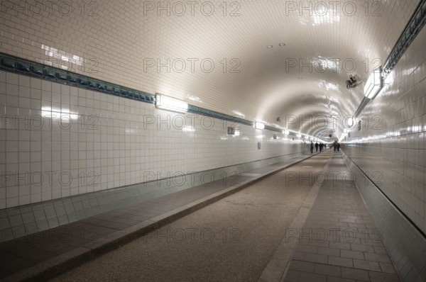 Interior view, pedestrians crossing tunnel, mopping effect, tube, historic old Elbe Tunnel, Free and Hanseatic City of Hamburg, Germany