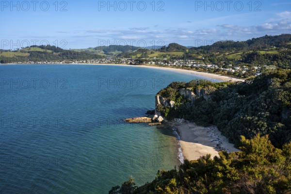 Landscape with sea and sandy beach in New Zealand. View of Lonely Bay and Cooks Beach from Shakespeare Cliff. Cooks Beach, Coromandel Peninsula, Waikato, New Zealand