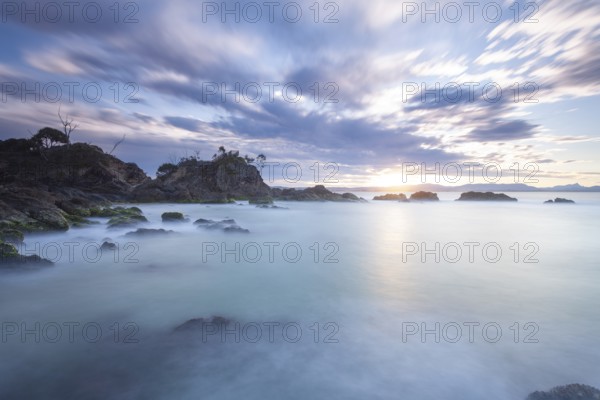 Sunset at Fisherman's Lookout. Dramatic waves and coastal scenery at The Pass, New South Wales, Australia