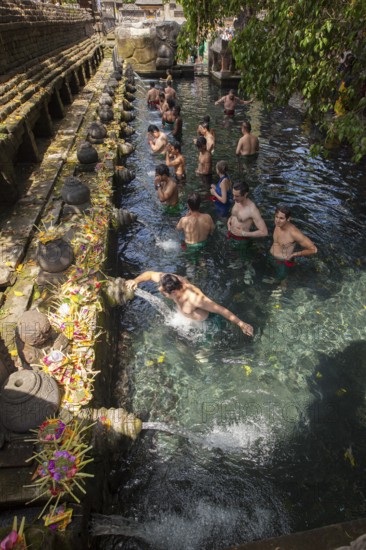 Bathers in Tirta Empul Hot Springs, Bali, Indonesia