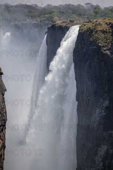 Water plunges into the depths, Victoria Falls with gorge, Zambezi, Zimbabwe