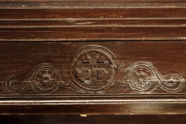 Wood carving with cross symbol, Heritage Hotel Privacy, Vembanad Lake, Kerala, India