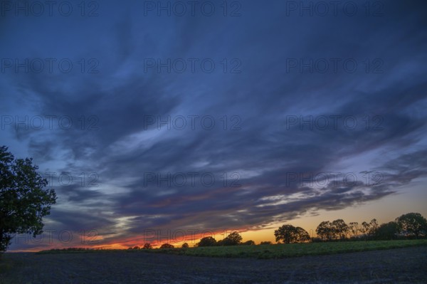 Red blue evening sky, Othenstorf, Mecklenburg-Western Pomerania, Germany
