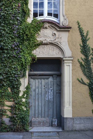 Stucco decoration above the entrance to Johanneum, built in 1905, near St. Johannis 1-3, Hanseatic City of LÃ¼beck, Schlesawig-Holstein, Germany