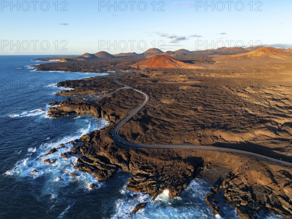 Coast with lava fields, volcanic landscape near Los Hervideros, in the evening light, aerial view, Lanzarote, Canary Islands, Spain
