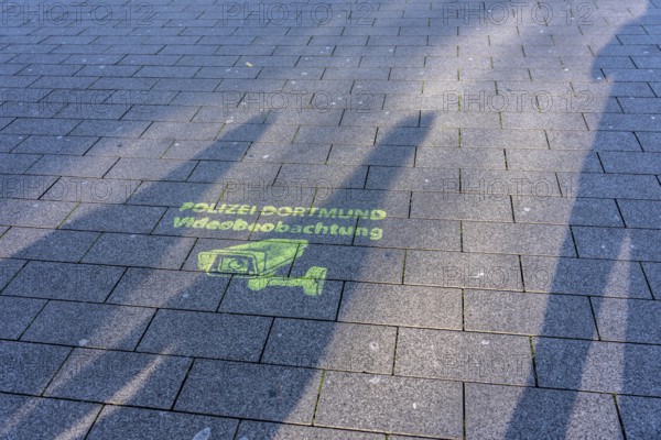 Note, sprayed on the ground that the police have set up comprehensive video surveillance in the city center of Dortmund, in front of the main train station, to prevent and investigate crimes, crime, North Rhine-Westphalia, Germany