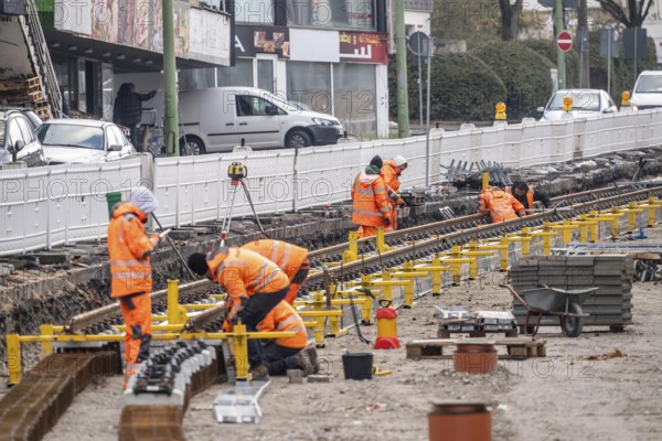 Large-scale construction site in the city center of Essen, HerkulesstraÃŸe, the construction of new tracks for the new Stadtbahn-Essen, a new tram line in the city center that will connect the west of the city with the new Essen-51 district, North Rhine-Westphalia, Germany
