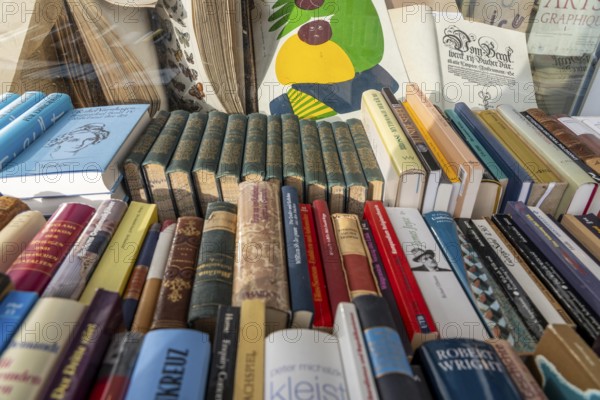 Table with partly old books, offered by a second-hand bookshop