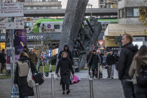 Downtown Essen, passers-by at Europaplatz, main train station, mining monument Steile Lagerung, North Rhine-Westphalia, Germany