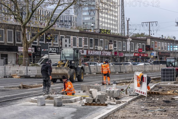 Large construction site in the city center of Essen, HachestraÃŸe am Hauptbahnhof, the construction of new tracks for the new Stadtbahn-Essen, a new tram line in the city center that will connect the west of the city with the new Essen-51 district, North Rhine-Westphalia, Germany