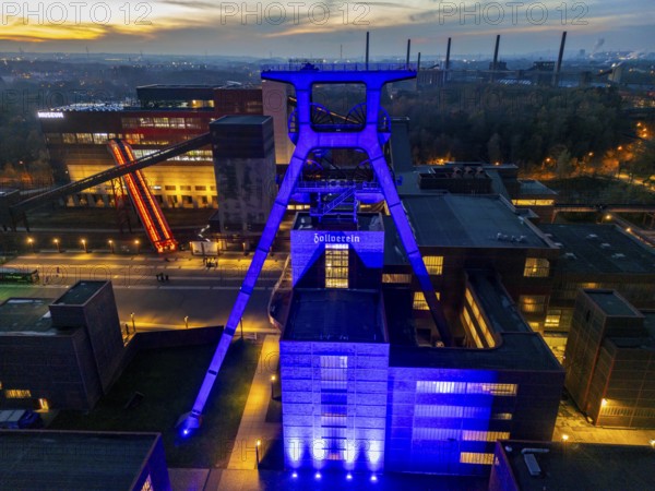 International Children's Rights Day, in addition buildings around the world are illuminated blue, over 60 in Germany, blue illumination for the worldwide action of the United Nations Children's Fund, UNICEF, here the UNESCO World Heritage Zeche Zollverein, the Doppelbock conveyor framework of Schacht XII, Essen, North Rhine-Westphalia