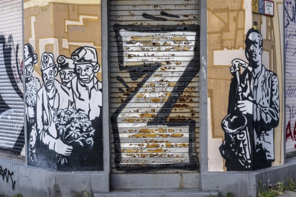 Street art in Essen, graffiti on an empty building on VarnhorststraÃŸe, city center, North Rhine-Westphalia, Germany